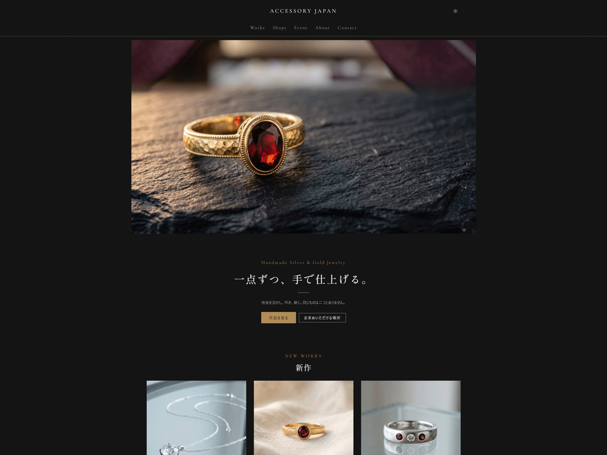 The Genva Craft front page in dark mode: the ring photograph and a white heading on black, with a gold button